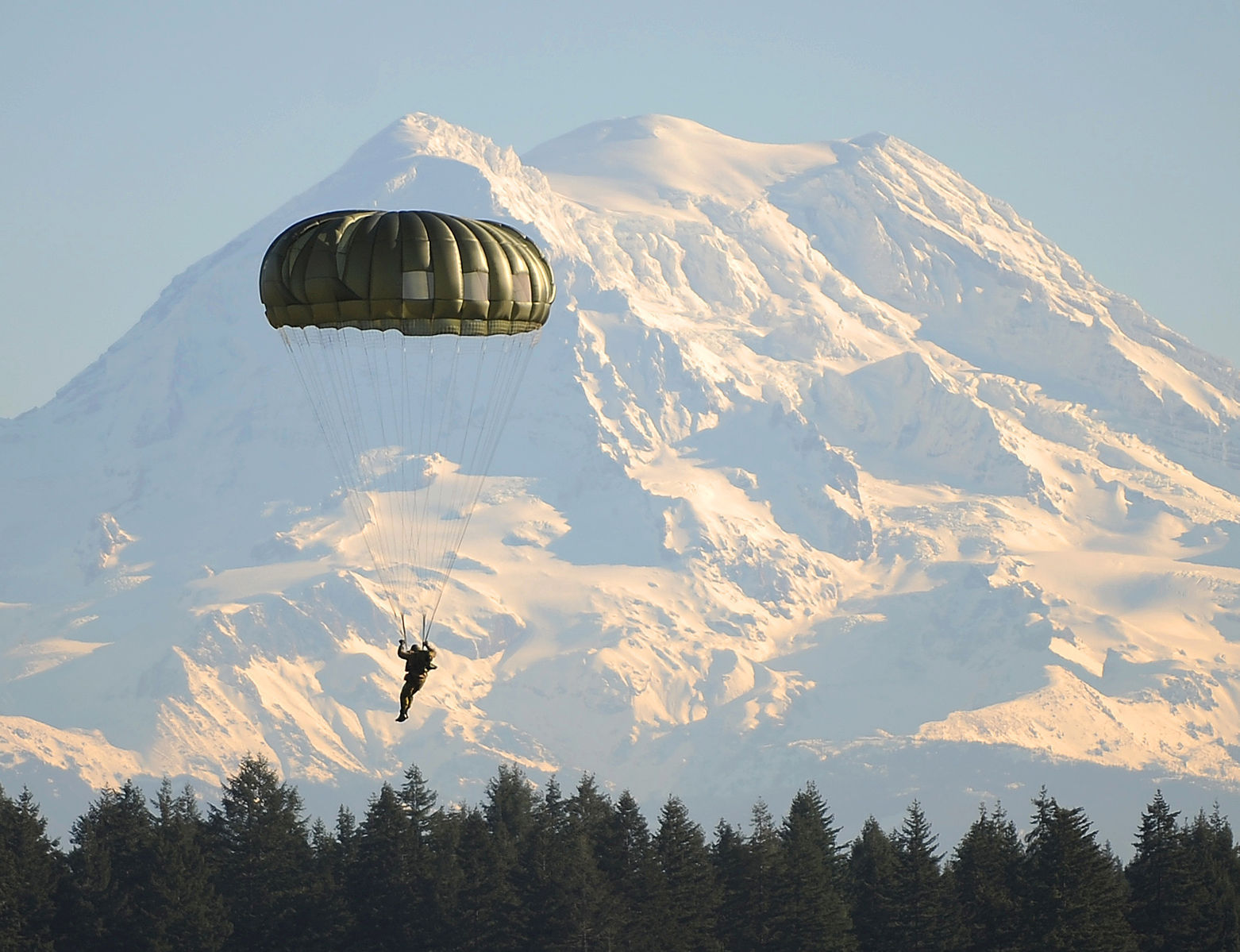 U.S. Army parachute with Mt. Rainier in the background.